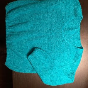Made in Italy. Vibrant aqua color soft V-neck sweater. Size L. Worn only twice
